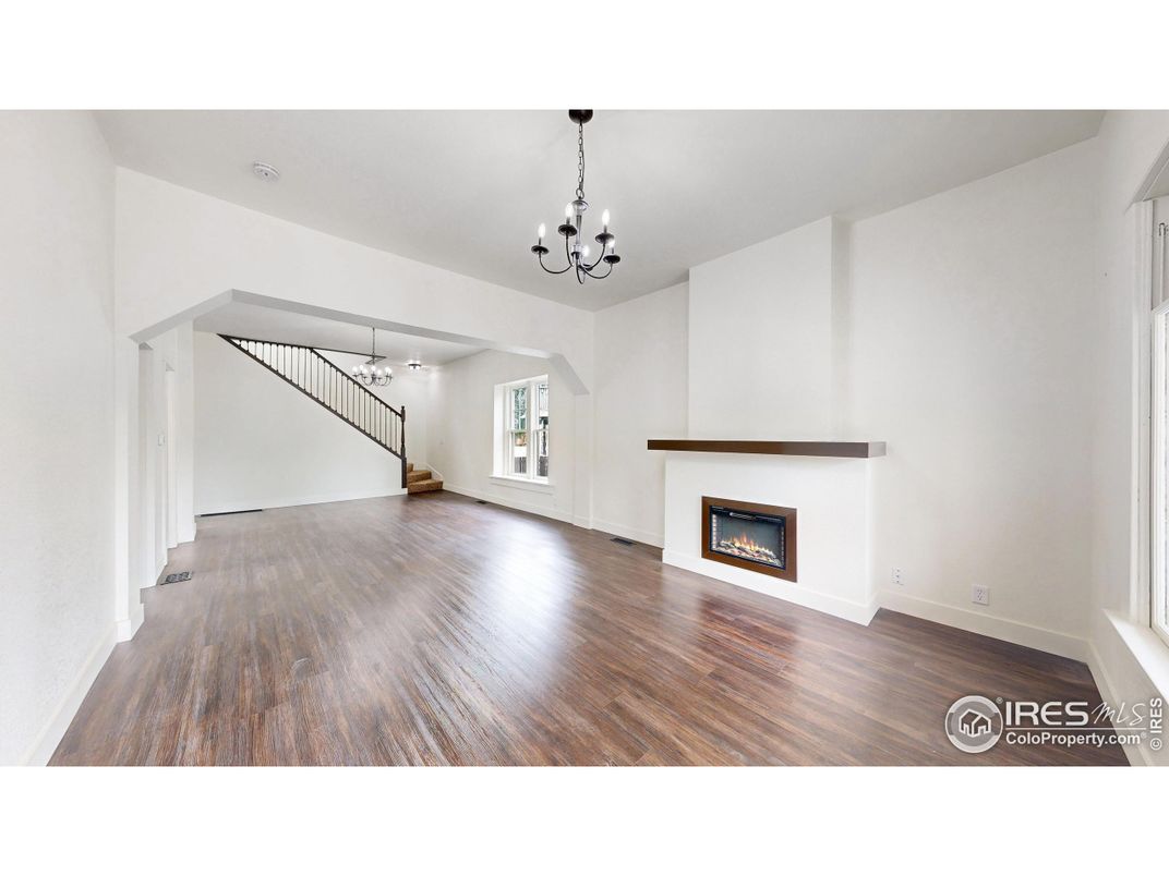 Chandelier, Empty room, Fireplace, Interior, Wood Texture Flooring