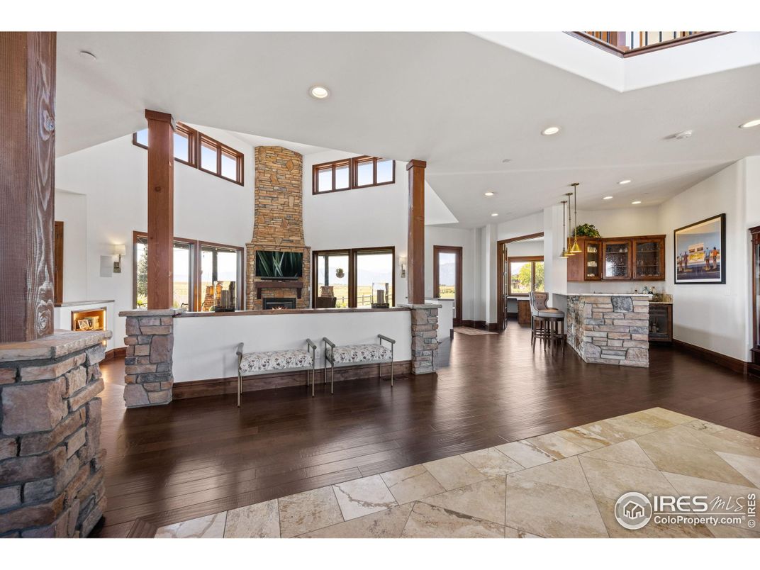 Dining room, Fireplace, Interior, Pendant Lights, Recessed Lighting, Wood Texture Flooring