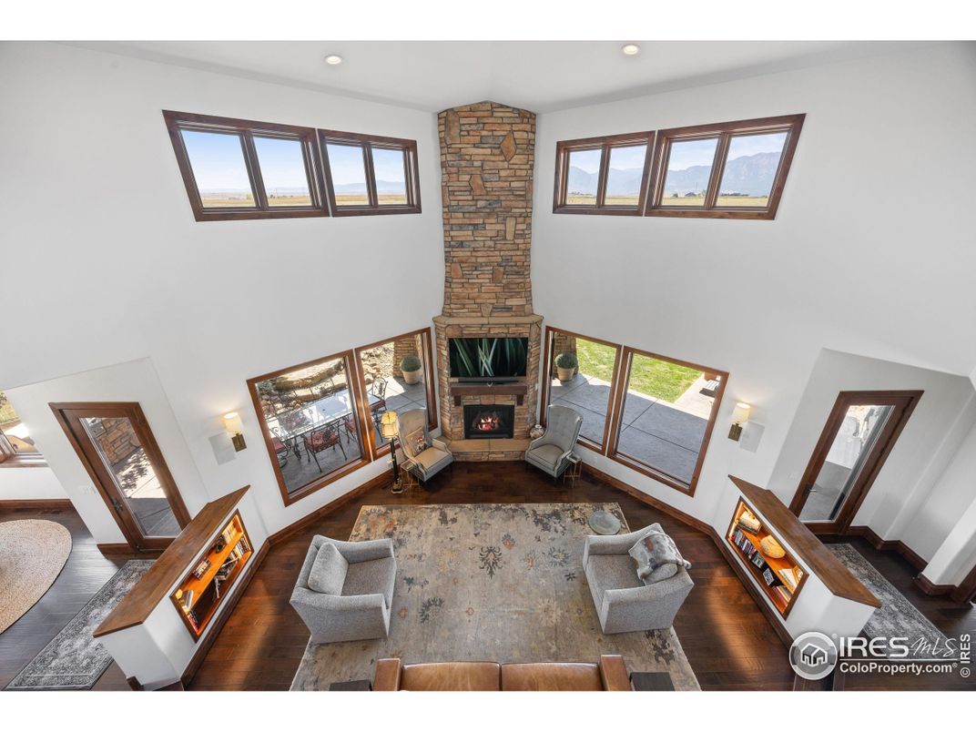 Fireplace, Interior, Living room, Recessed Lighting, Stone Walls, Wood Texture Flooring