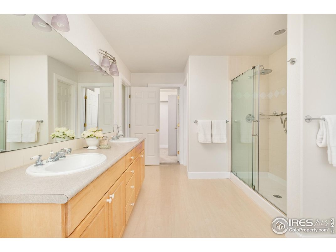 Bathroom, Dual Sink Vanities, Glass Shower, Interior, Wood Texture Flooring