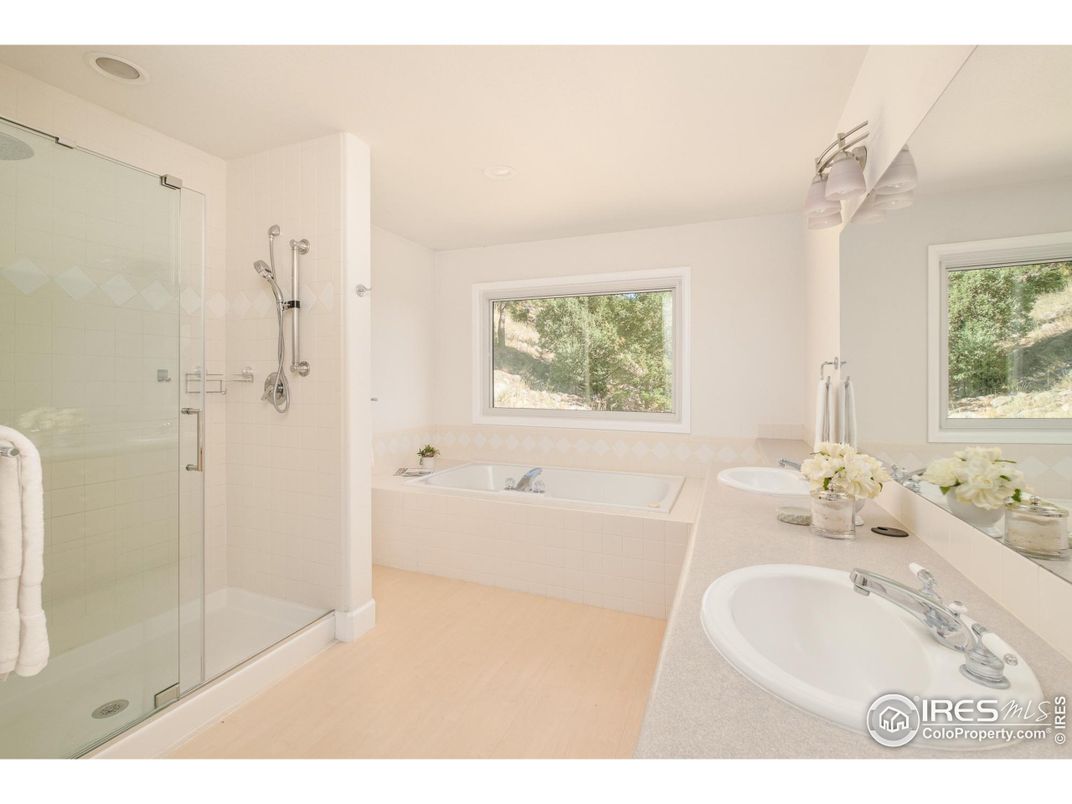 Bathroom, Dual Sink Vanities, Glass Shower, Interior, Recessed Lighting, Wood Texture Flooring