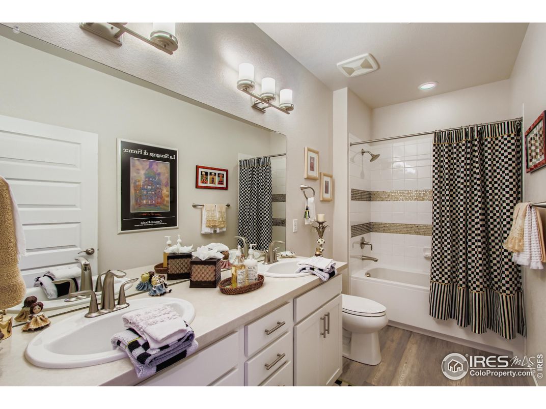 Bathroom, Dual Sink Vanities, Interior, Recessed Lighting, Wood Texture Flooring