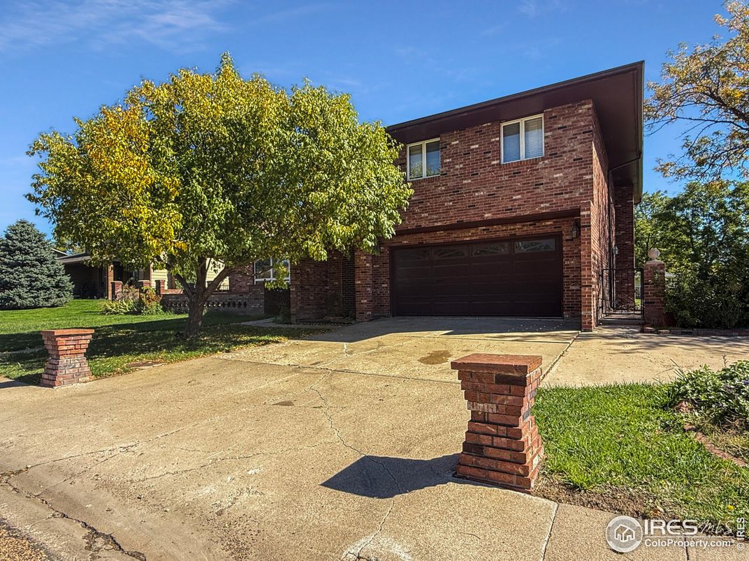 Attached, Exterior, Facade, Brick Facade, Modern