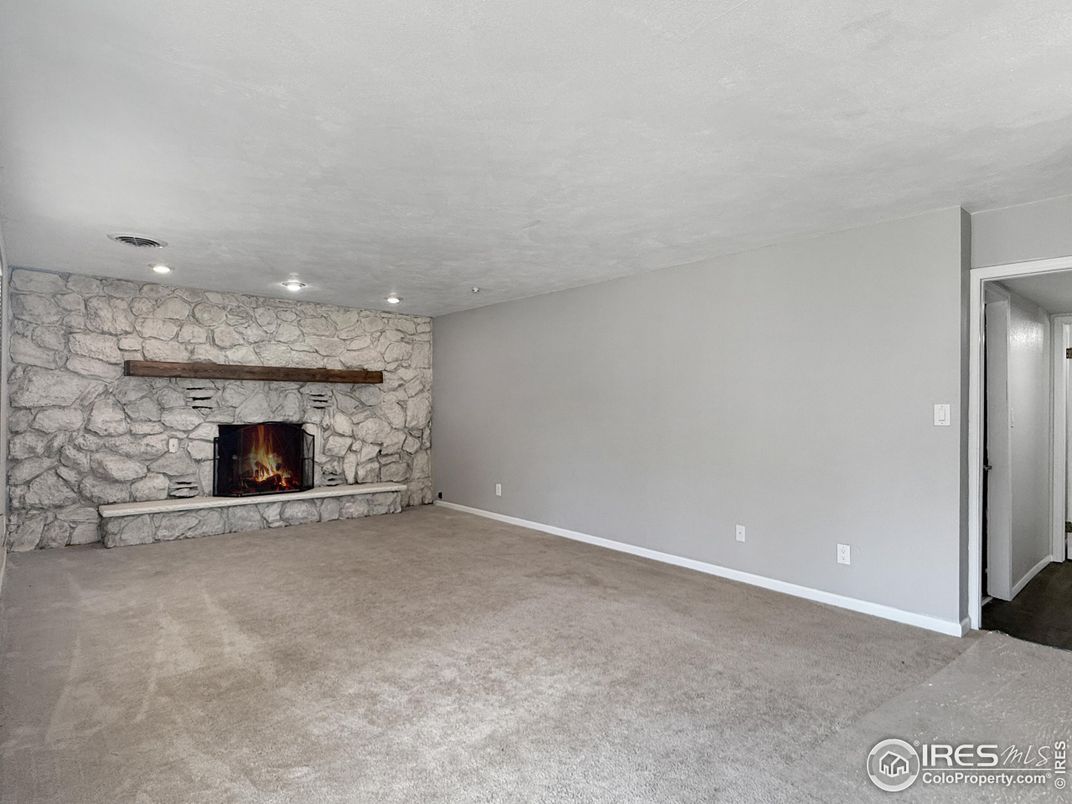Empty room, Fireplace, Interior, Recessed Lighting, Stone Walls