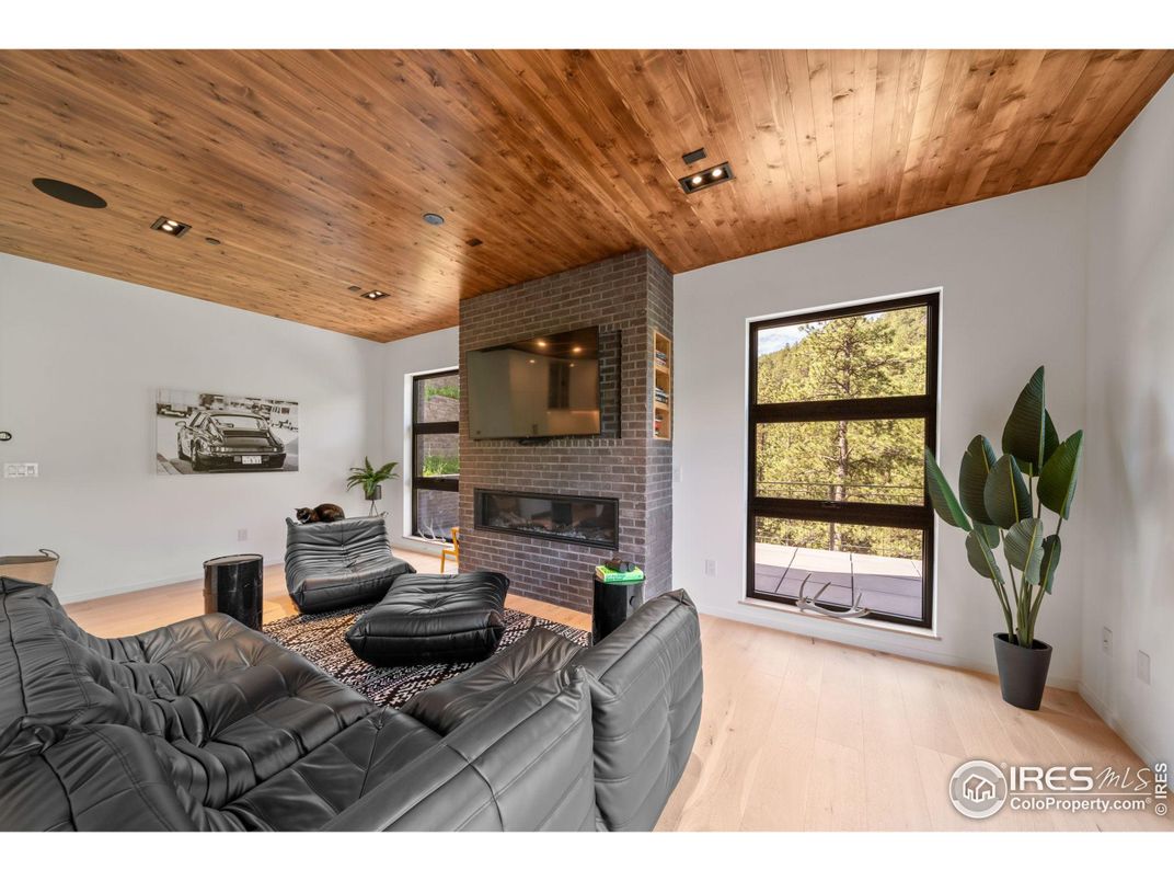 Fireplace, Interior, Living room, Recessed Lighting, Stone Walls, Wooden Ceilings, Wood Texture Flooring