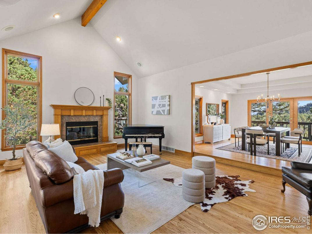 Chandelier, Dining room, Fireplace, Interior, Living room, Piano, Recessed Lighting, Wooden Beams, Wood Texture Flooring