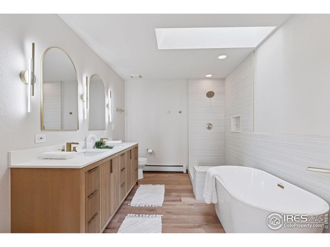 Bathroom, Dual Sink Vanities, Free Standing Baths, Interior, Recessed Lighting, Wood Texture Flooring