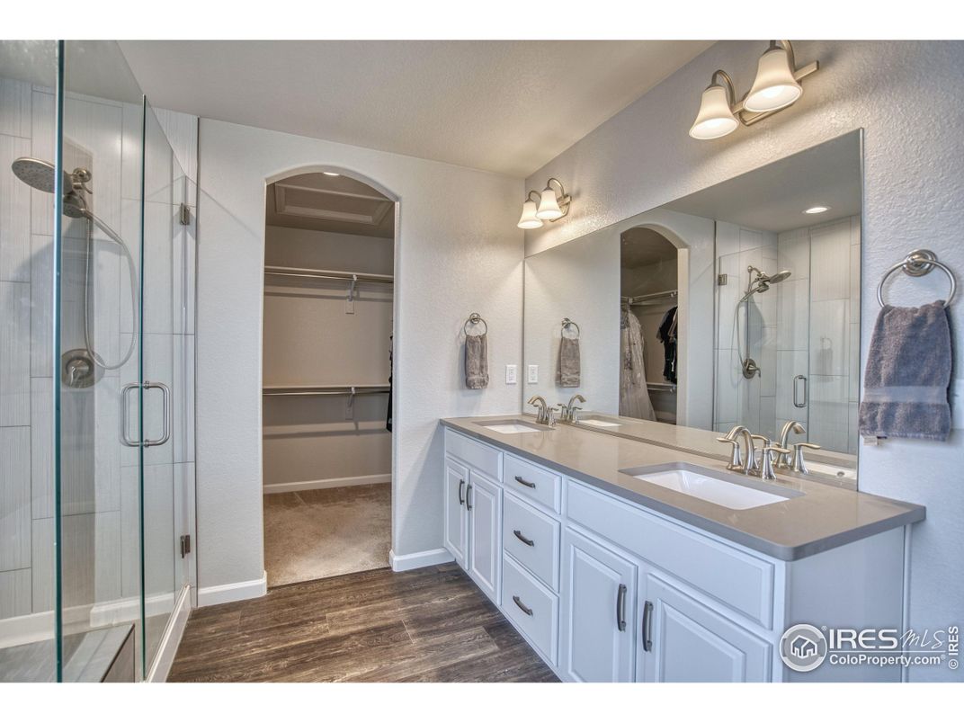 Bathroom, Dual Sink Vanities, Glass Shower, Interior, Walk-in Closets, Wood Texture Flooring