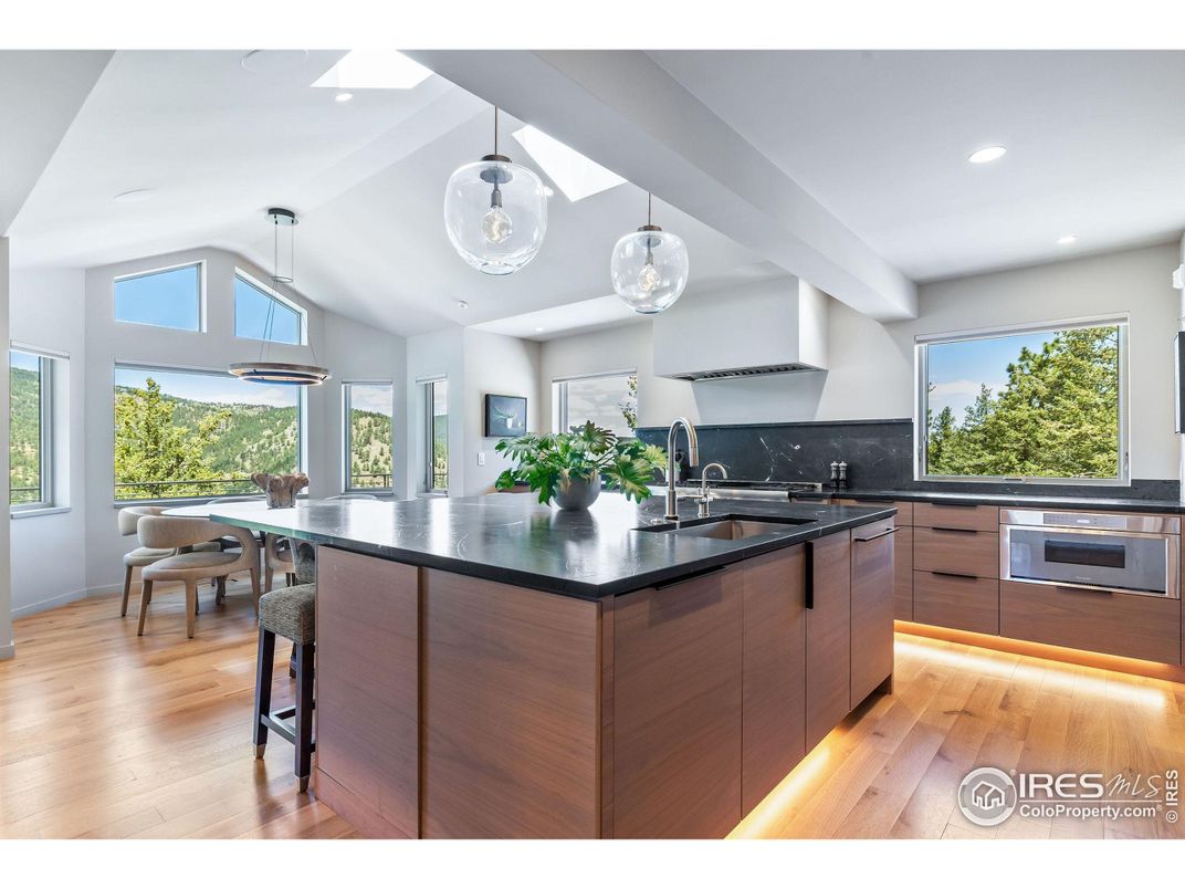 Dining room, Interior, Kitchen, Pendant Lights, Recessed Lighting, Stainless Steel Appliances, Wood Texture Flooring