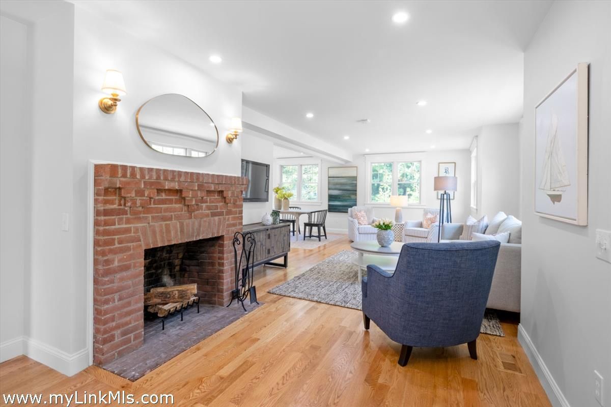 Dining room, Fireplace, Interior, Living room, Recessed Lighting, Wood Texture Flooring