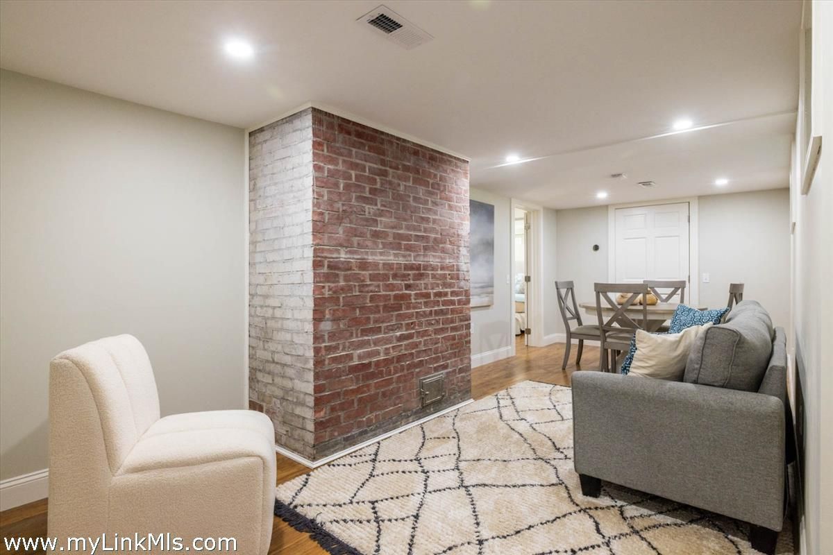 Dining room, Interior, Living room, Recessed Lighting, Stone Walls, Wood Texture Flooring