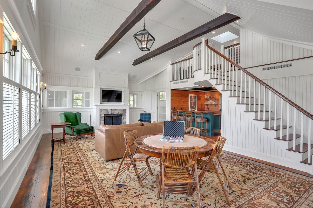 Dining room, Fireplace, Interior, Living room, Pendant Lights, Recessed Lighting, Wooden Beams, Wood Texture Flooring