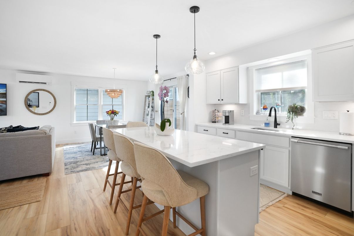 Dining room, Interior, Kitchen, Pendant Lights, Recessed Lighting, Stainless Steel Appliances, Wood Texture Flooring