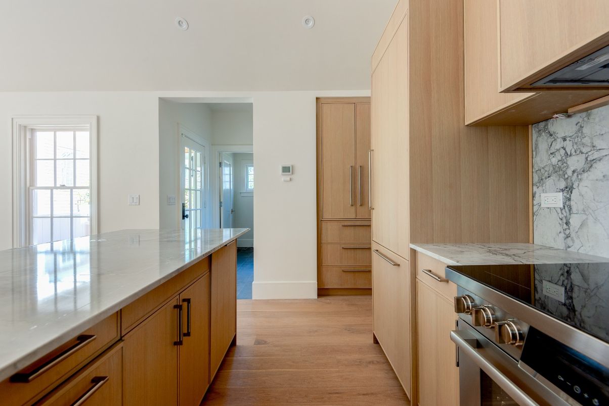 Interior, Kitchen, Marble Walls, Stainless Steel Appliances, Wood Texture Flooring