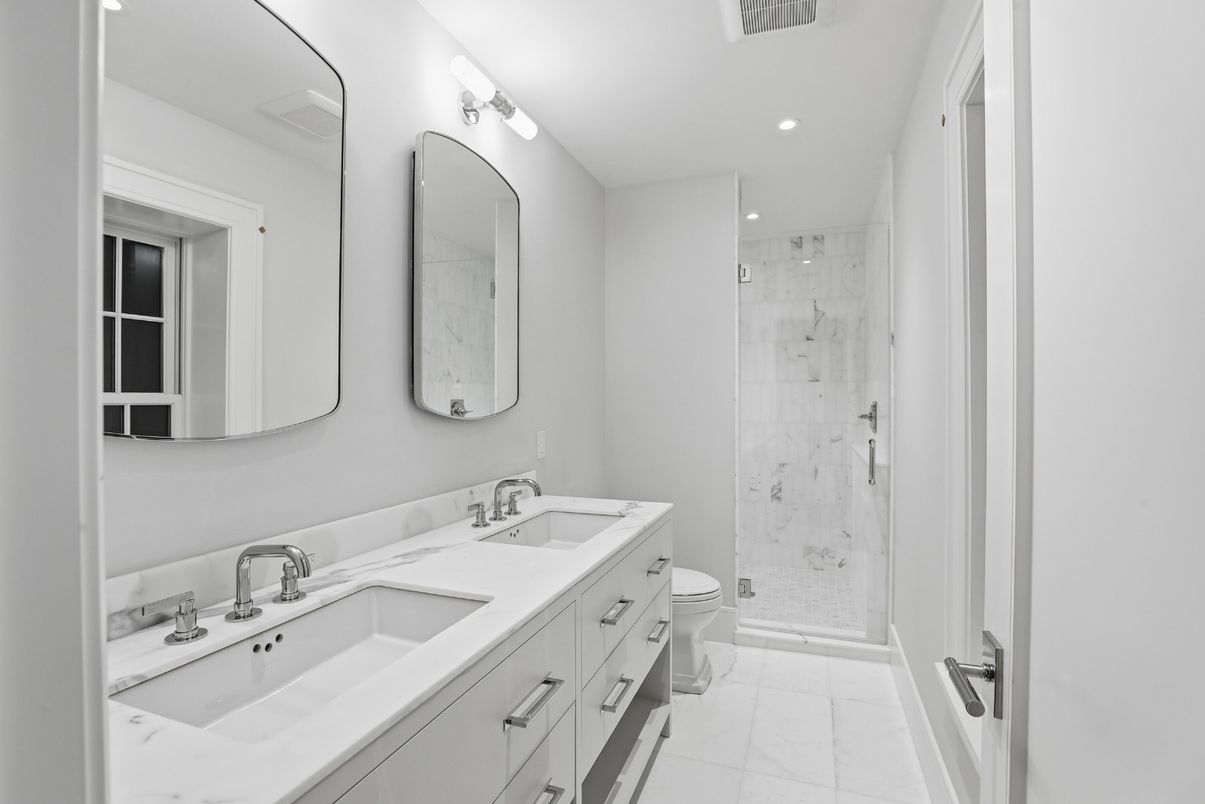 Bathroom, Dual Sink Vanities, Glass Shower, Interior, Marble, Marble Walls, Recessed Lighting