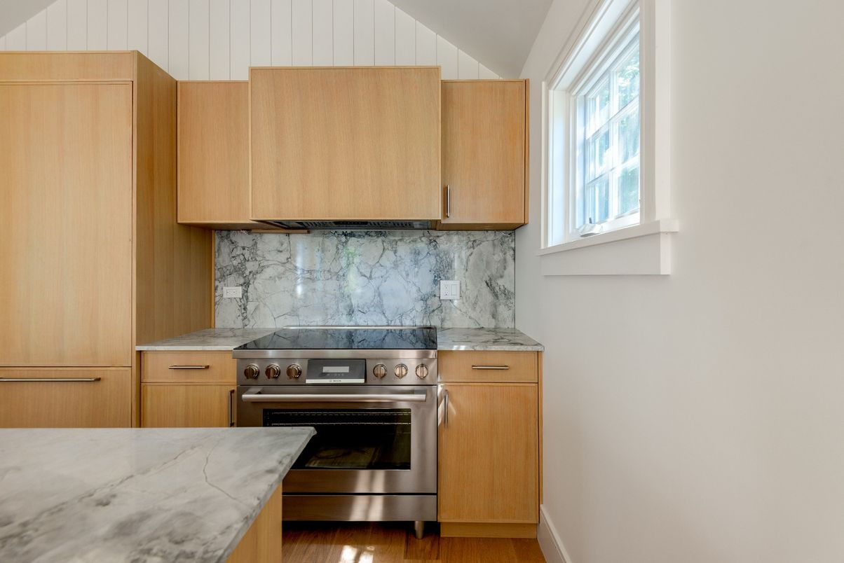 Interior, Kitchen, Marble Walls, Stainless Steel Appliances, Wood Texture Flooring