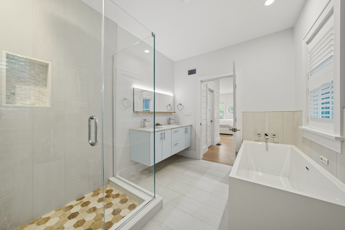 Bathroom, Dual Sink Vanities, Glass Shower, Interior, Recessed Lighting, Wood Texture Flooring