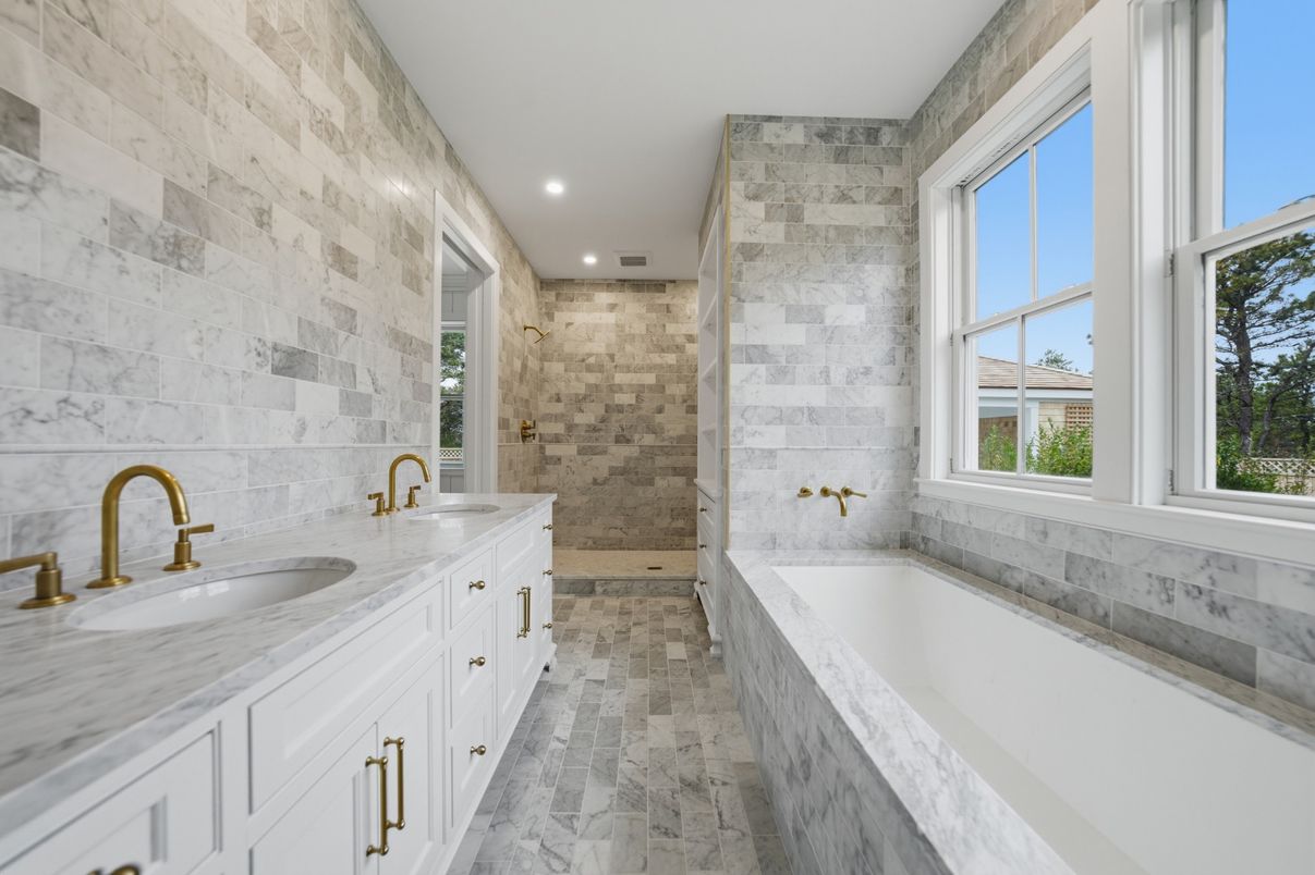 Bathroom, Dual Sink Vanities, Glass Shower, Interior, Marble, Recessed Lighting, Stone Walls