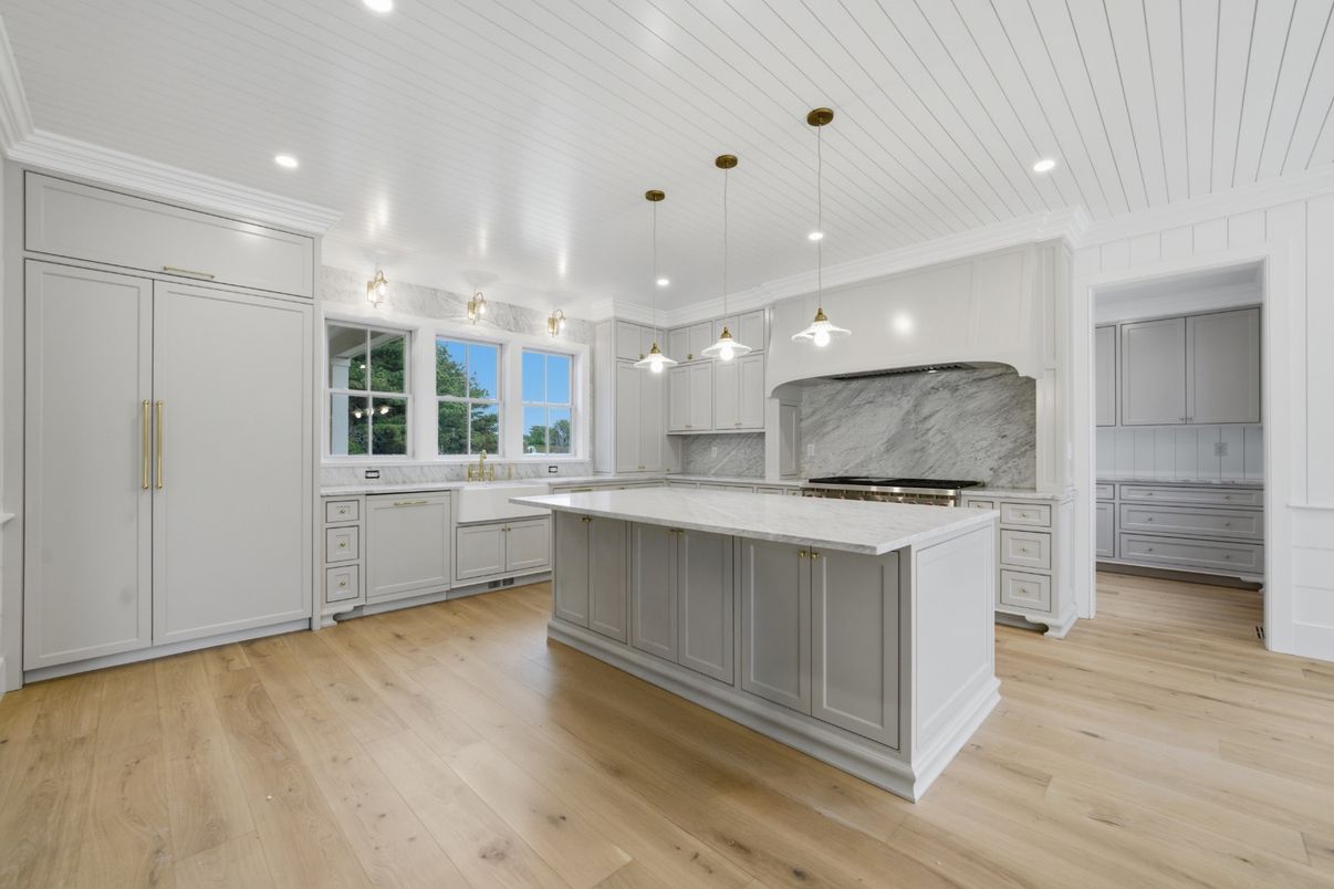 Interior, Kitchen, Marble Walls, Pendant Lights, Recessed Lighting, Wood Texture Flooring