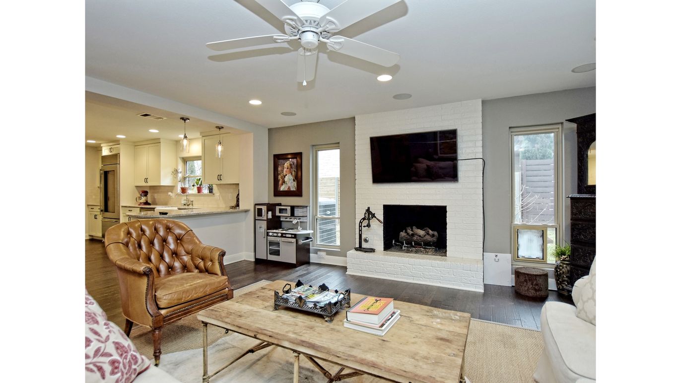 Fireplace, Interior, Kitchen, Living room, Pendant Lights, Recessed Lighting, Stainless Steel Appliances, Wood Texture Flooring