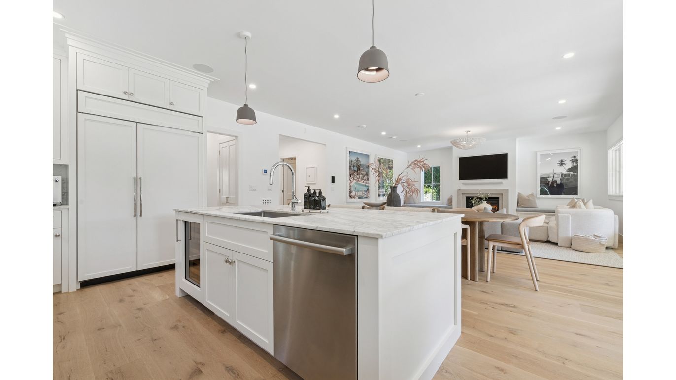 Dining room, Fireplace, Interior, Kitchen, Living room, Pendant Lights, Recessed Lighting, Stainless Steel Appliances, Wood Texture Flooring