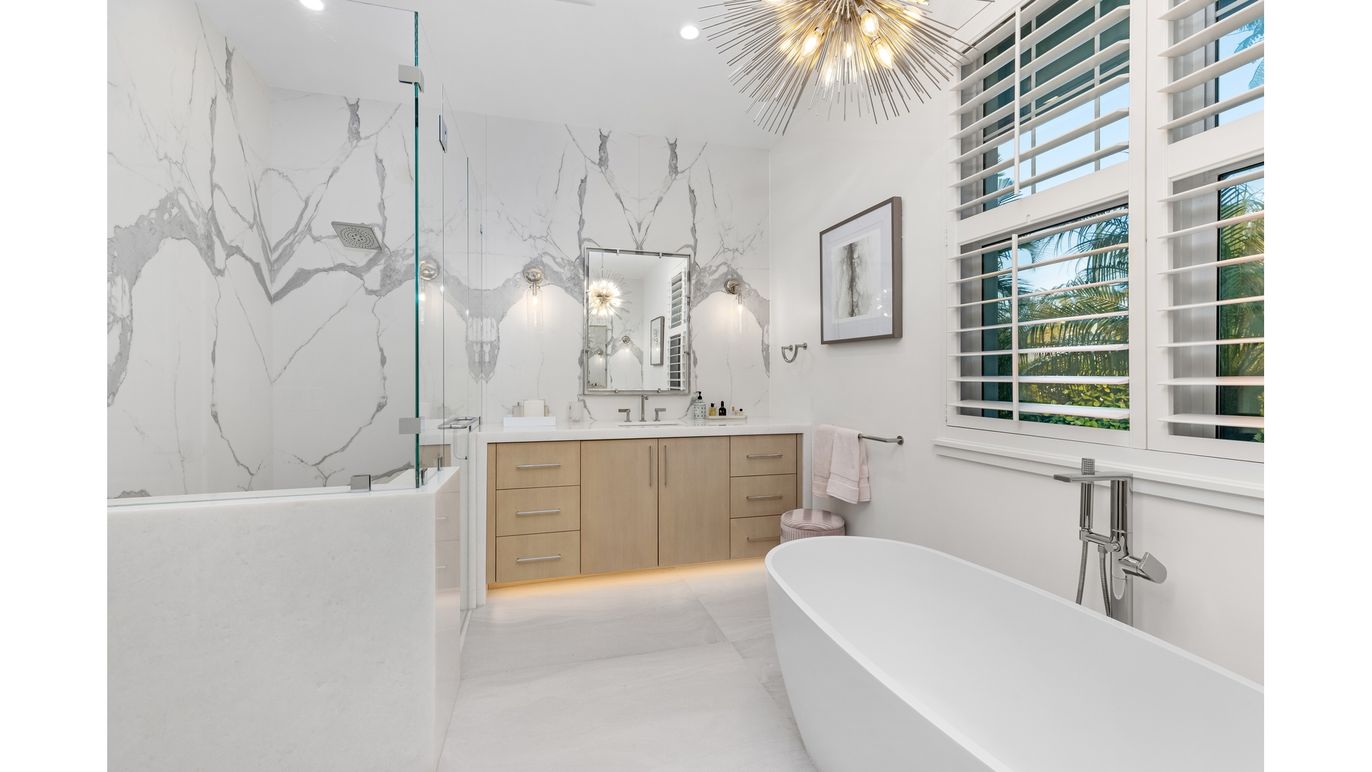 Bathroom, Chandelier, Dual Sink Vanities, Free Standing Baths, Interior, Marble, Marble Walls, Pendant Lights, Recessed Lighting