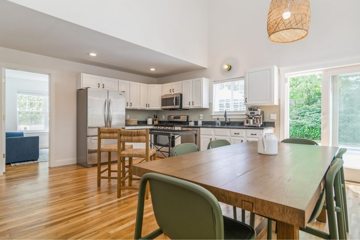Dining room, Interior, Kitchen, Pendant Lights, Recessed Lighting, Stainless Steel Appliances, Wood Texture Flooring