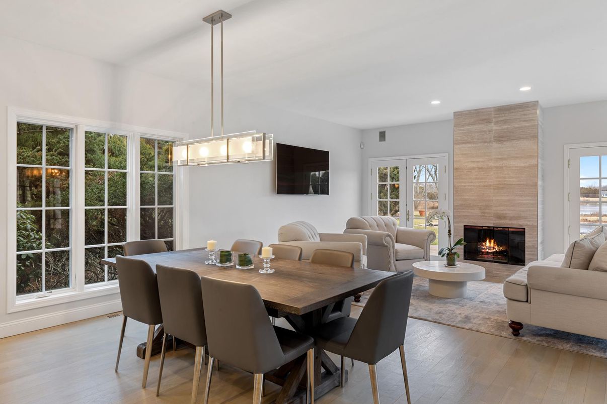 Dining room, Fireplace, Interior, Living room, Pendant Lights, Recessed Lighting, Wood Texture Flooring