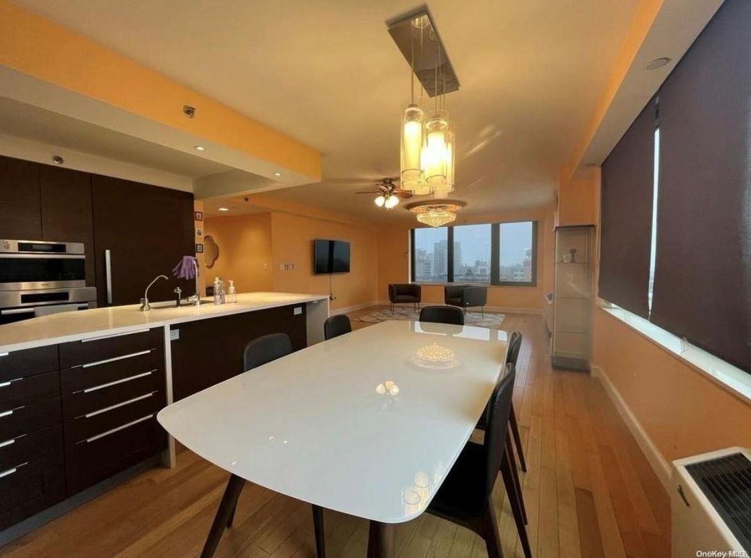 Dining room, Interior, Kitchen, Pendant Lights, Recessed Lighting, Stainless Steel Appliances, Wood Texture Flooring