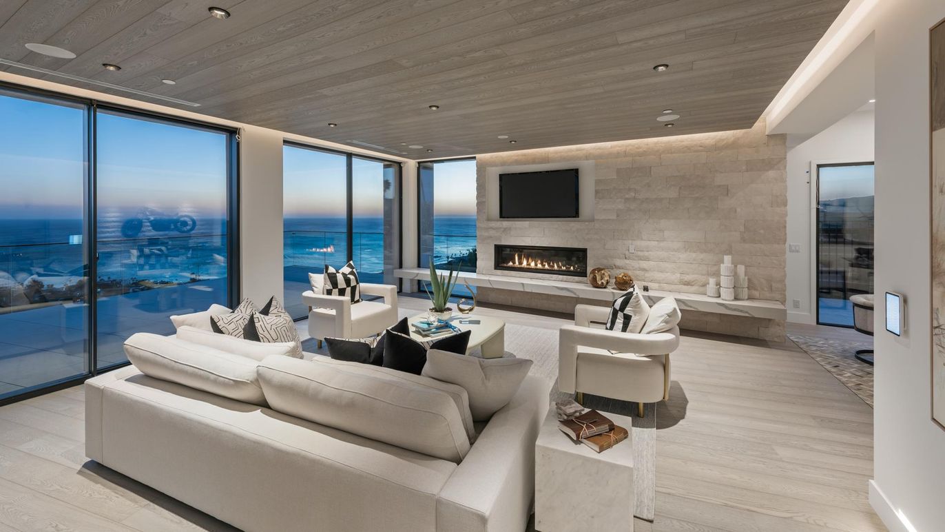 Fireplace, Interior, Living room, Recessed Lighting, Stone Walls, Water, Wooden Ceilings, Wood Texture Flooring