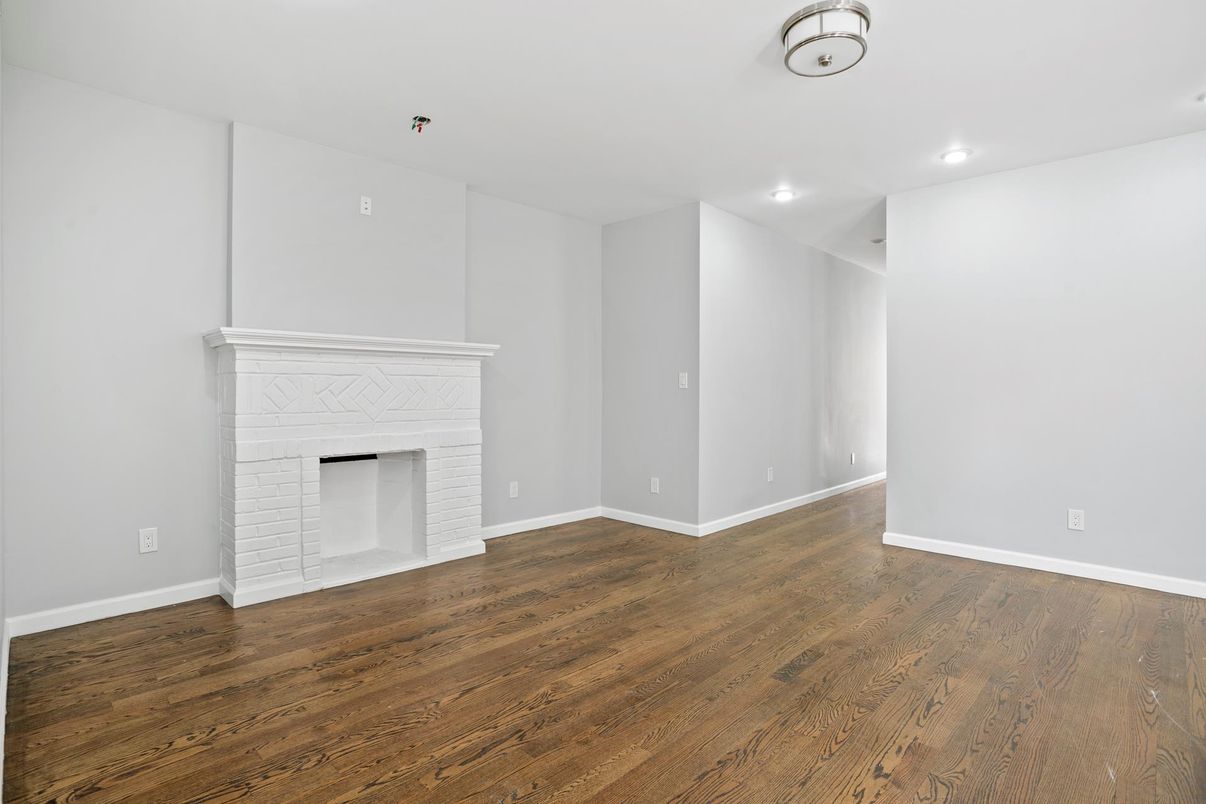 Empty room, Fireplace, Interior, Recessed Lighting, Wood Texture Flooring