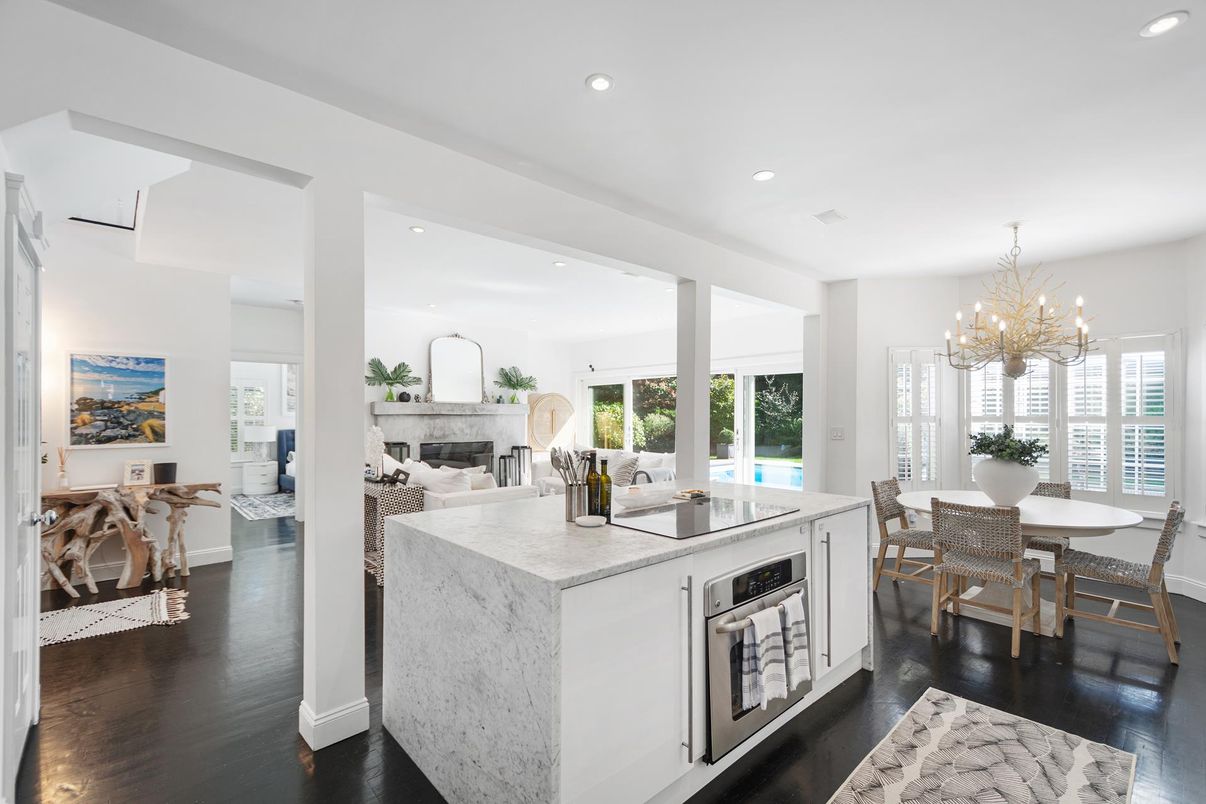 Chandelier, Dining room, Fireplace, Interior, Kitchen, Living room, Recessed Lighting, Wood Texture Flooring