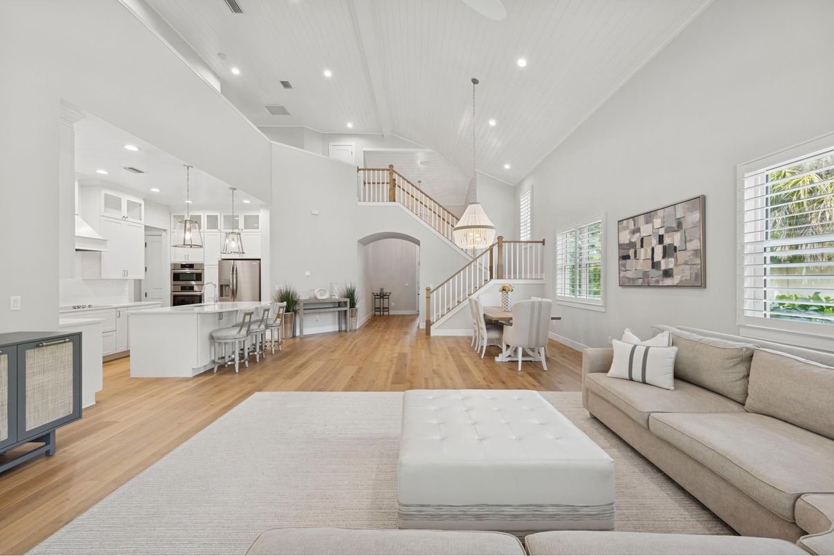 Chandelier, Dining room, Interior, Kitchen, Living room, Pendant Lights, Recessed Lighting, Stainless Steel Appliances, Wood Texture Flooring