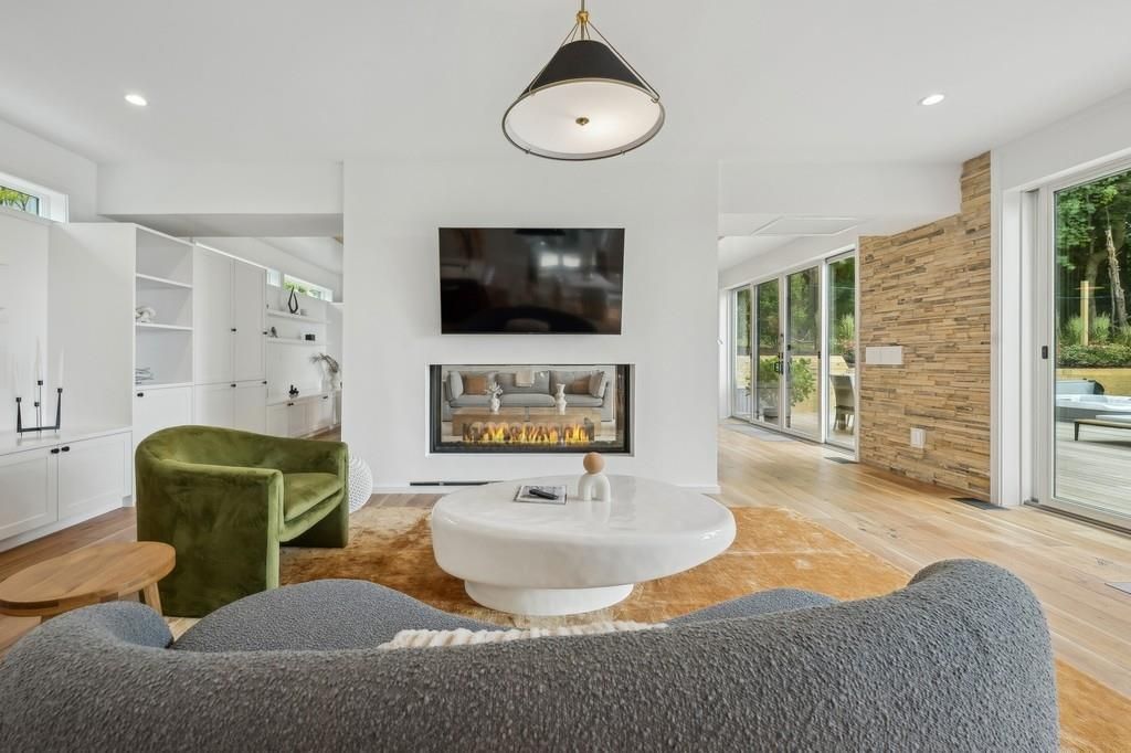 Fireplace, Interior, Living room, Recessed Lighting, Stone Walls, Wood Texture Flooring, Wooden Walls