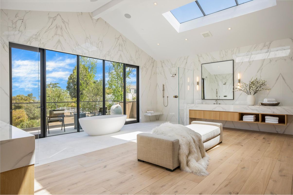 Bathroom, Dual Sink Vanities, Free Standing Baths, Interior, Marble Walls, Recessed Lighting, Wood Texture Flooring