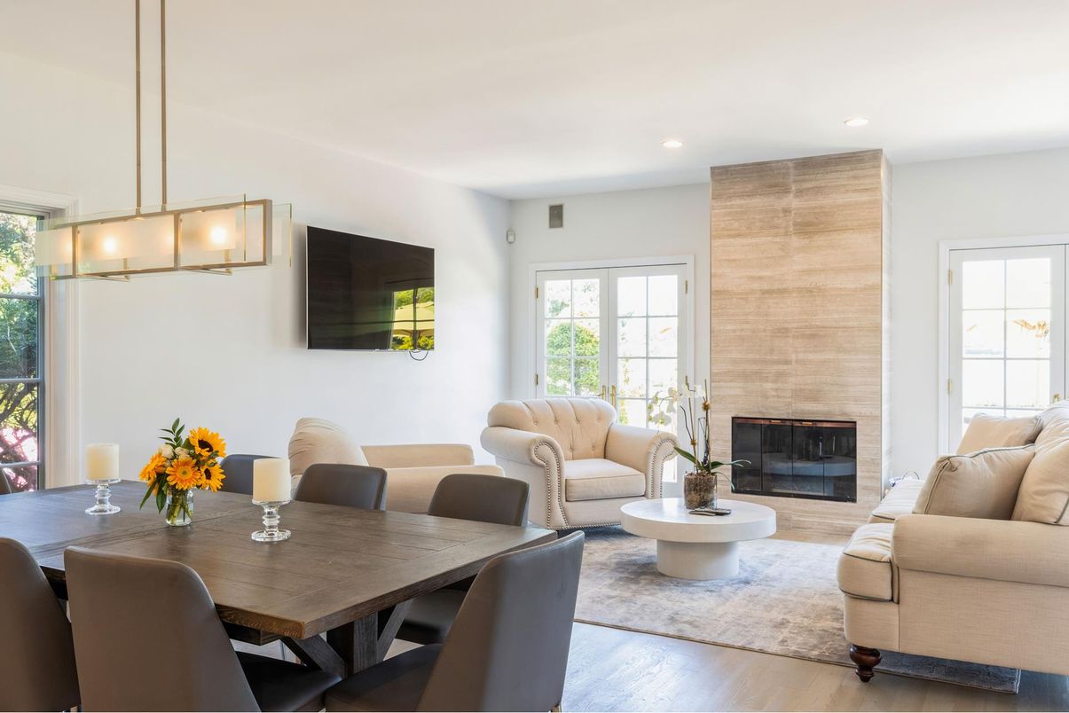 Dining room, Fireplace, Interior, Living room, Pendant Lights, Recessed Lighting, Wood Texture Flooring