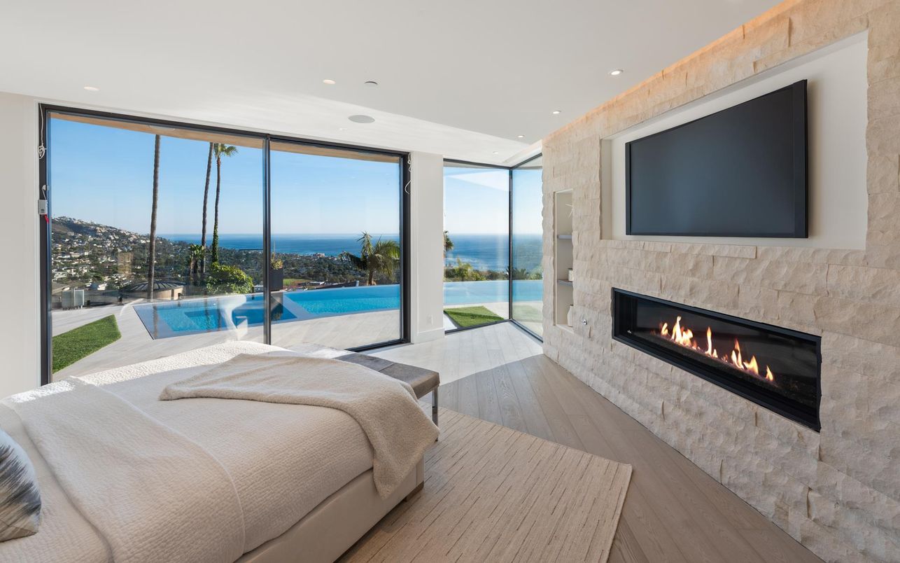 Bedroom, Fireplace, Interior, Recessed Lighting, Water, Wood Texture Flooring