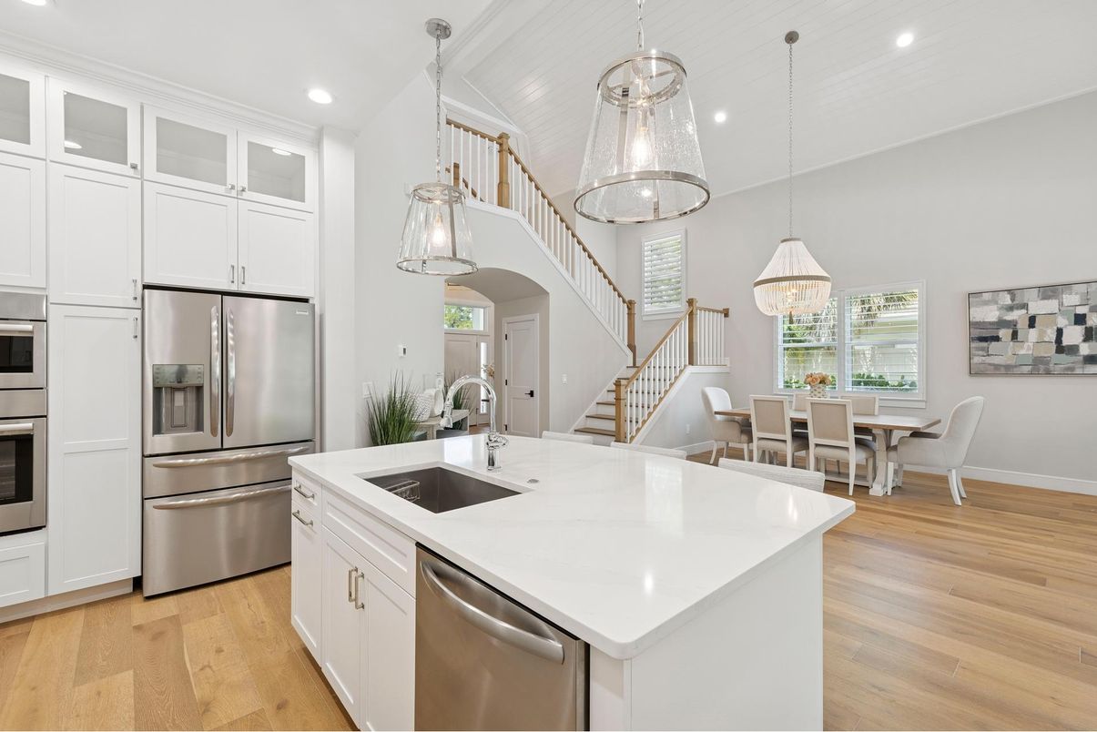 Dining room, Interior, Kitchen, Pendant Lights, Recessed Lighting, Stainless Steel Appliances, Wood Texture Flooring