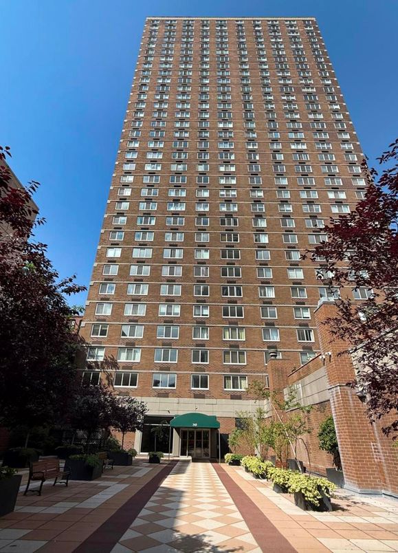 Exterior, Facade, Brick Facade, Condo Building