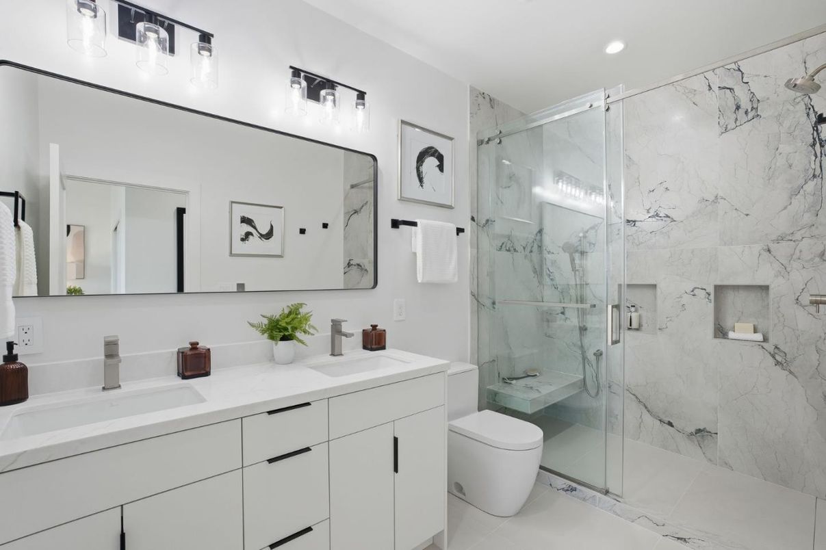 Bathroom, Dual Sink Vanities, Glass Shower, Interior, Marble Walls, Recessed Lighting