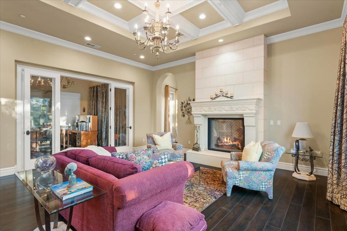 Chandelier, Fireplace, Interior, Living room, Recessed Lighting, Wood Texture Flooring