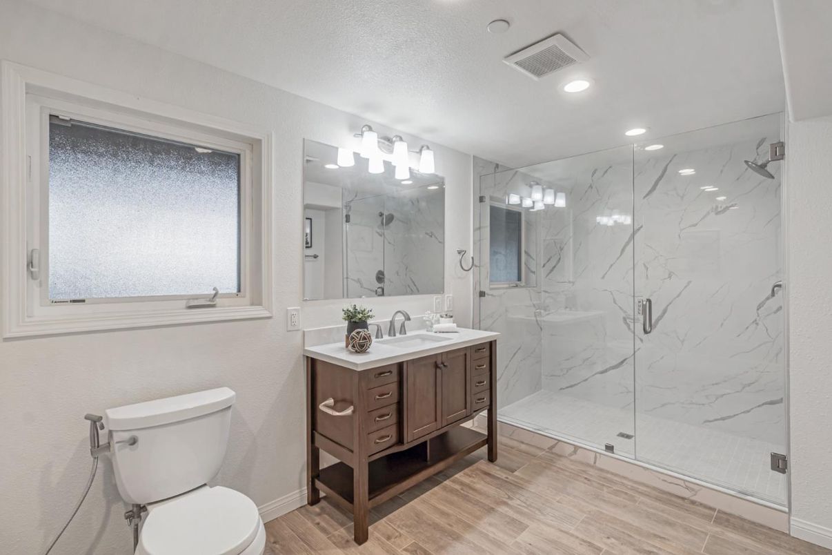 Bathroom, Glass Shower, Interior, Marble Walls, Recessed Lighting, Wood Texture Flooring