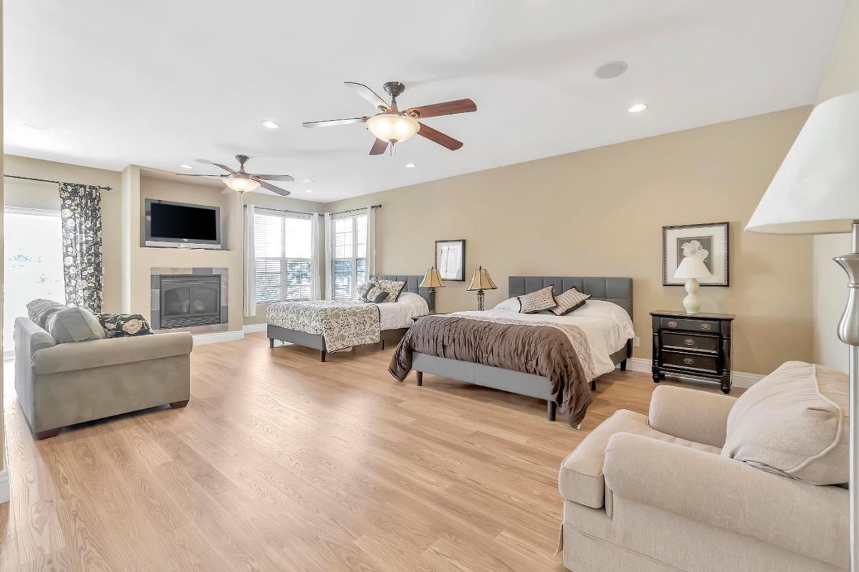 Bedroom, Fireplace, Interior, Recessed Lighting, Wood Texture Flooring