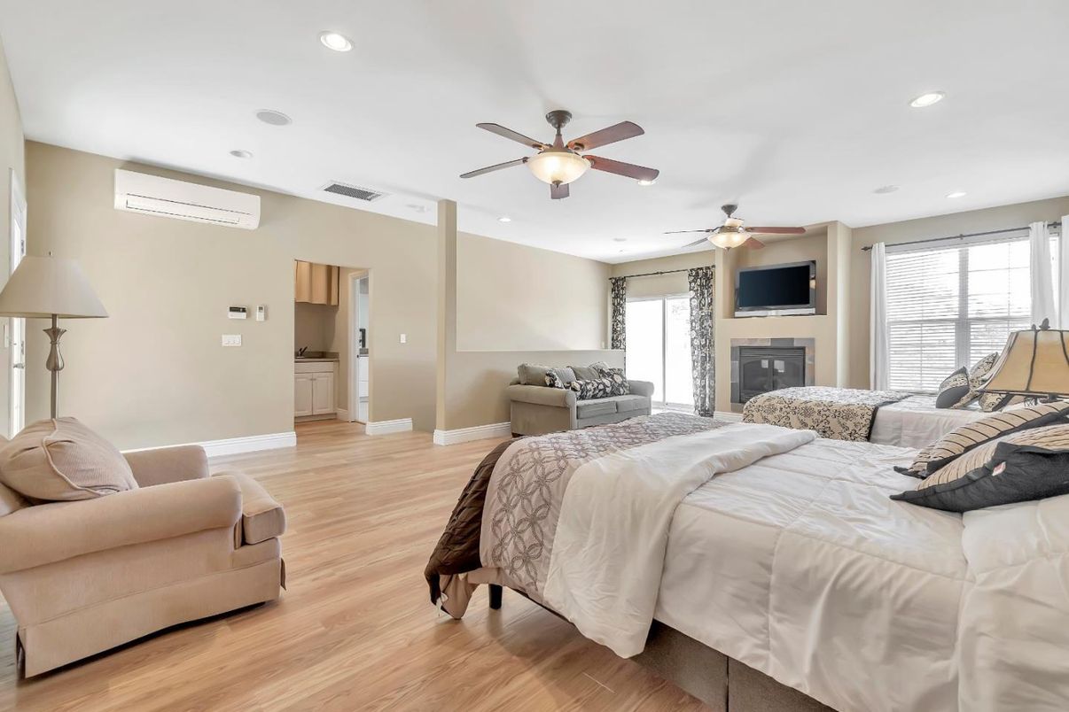 Bedroom, Fireplace, Interior, Recessed Lighting, Wood Texture Flooring