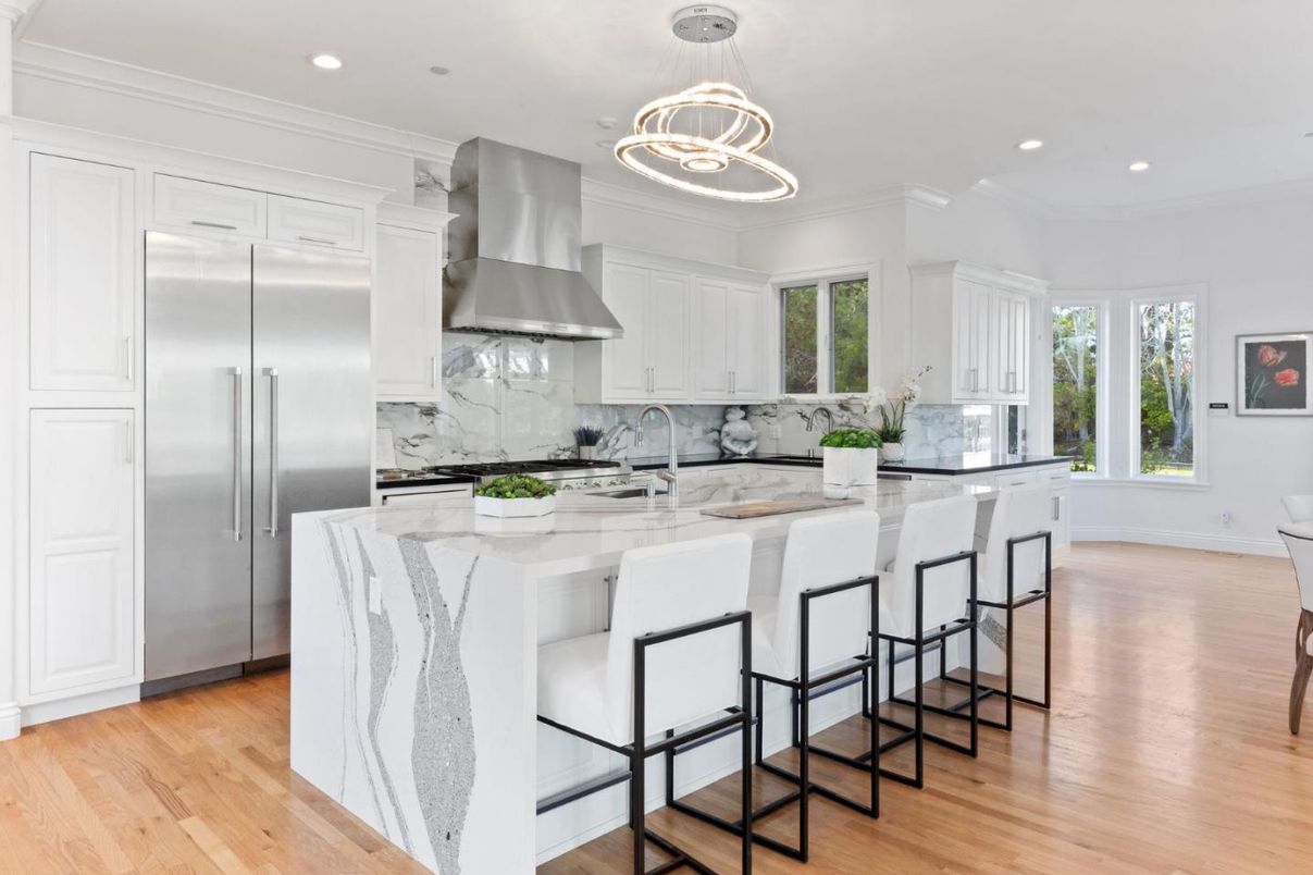 Interior, Kitchen, Marble Walls, Pendant Lights, Recessed Lighting, Stainless Steel Appliances, Wood Texture Flooring