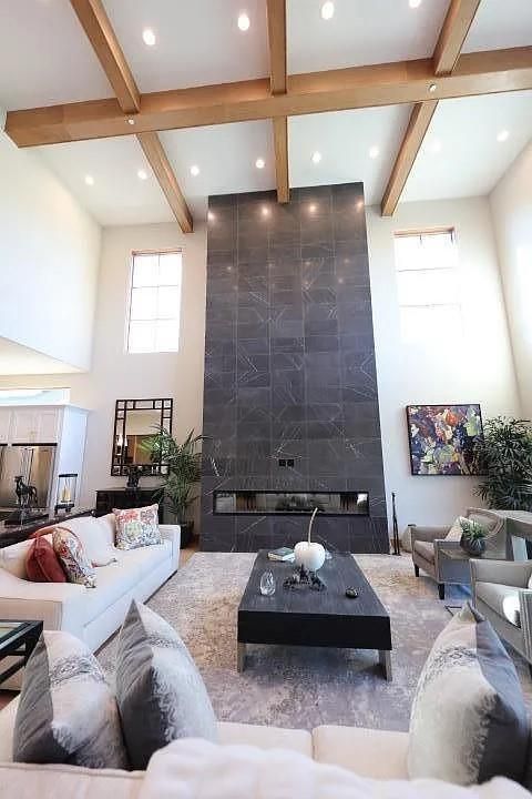 Fireplace, Interior, Living room, Marble Walls, Recessed Lighting, Wooden Beams