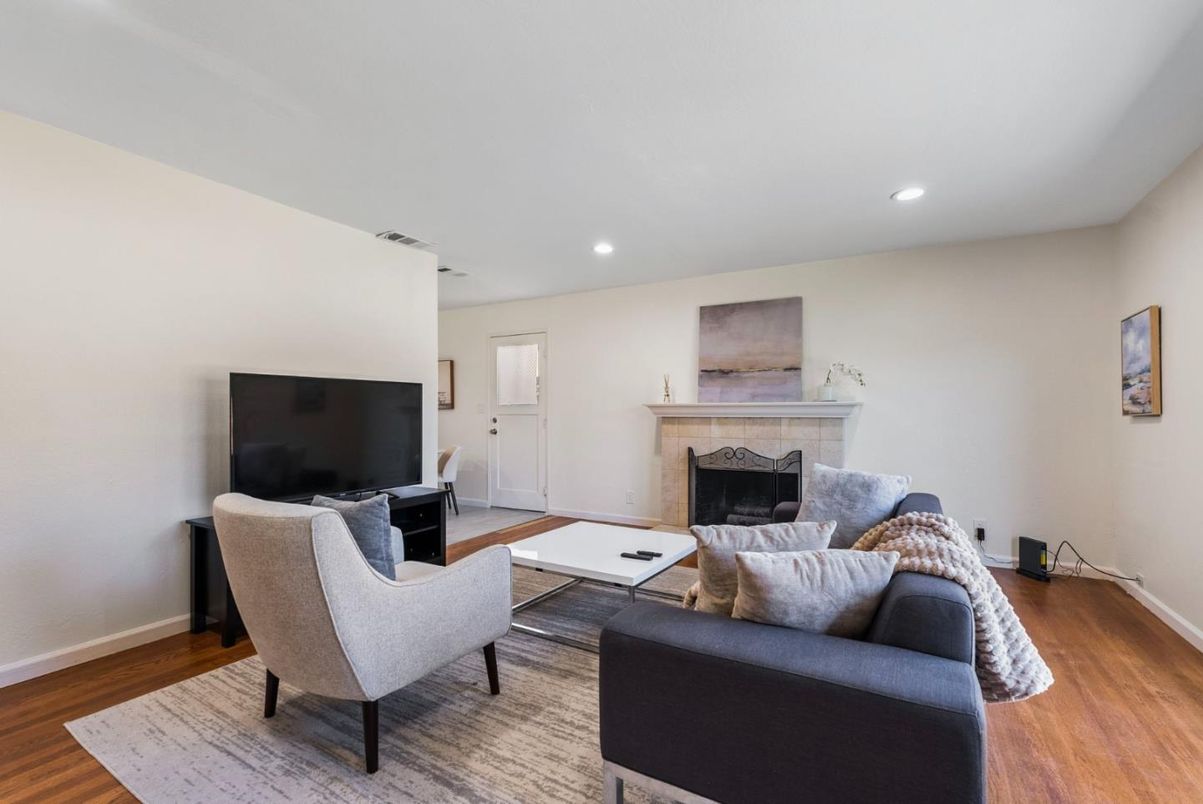 Fireplace, Interior, Living room, Recessed Lighting, Wood Texture Flooring