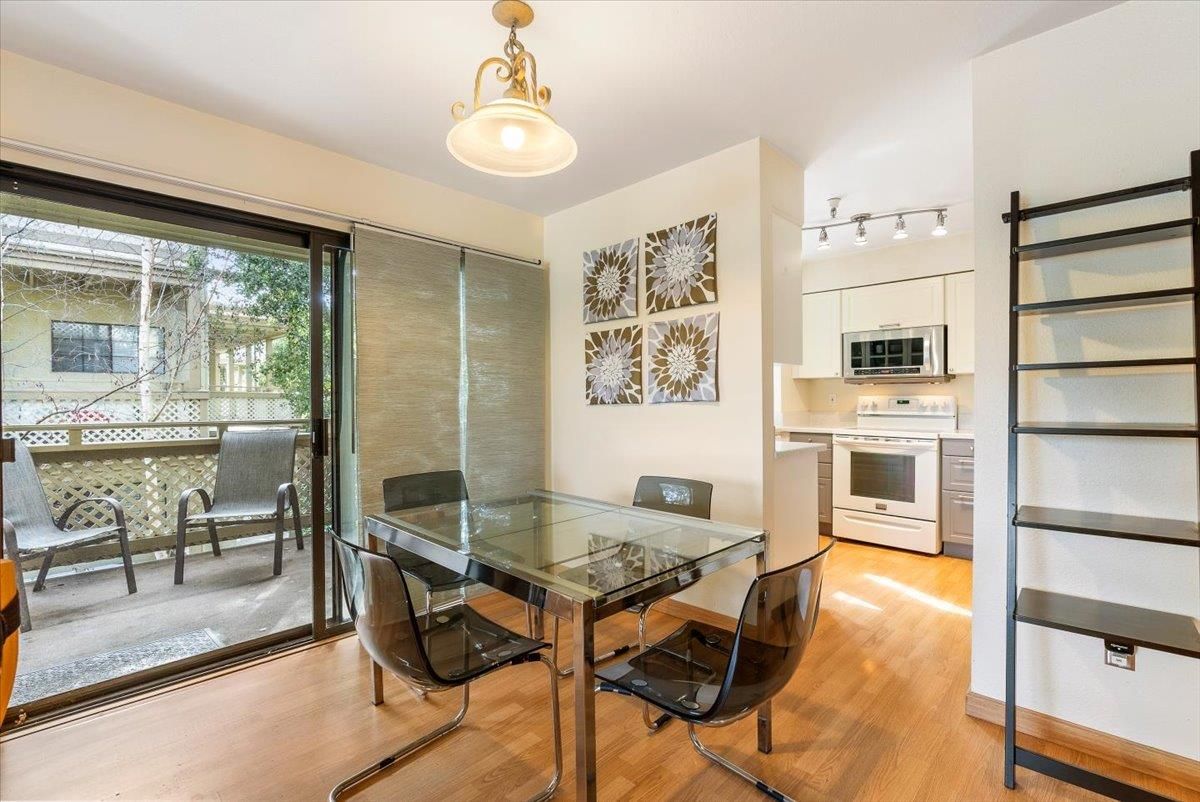 Dining room, Interior, Kitchen, Pendant Lights, Stainless Steel Appliances, Wood Texture Flooring