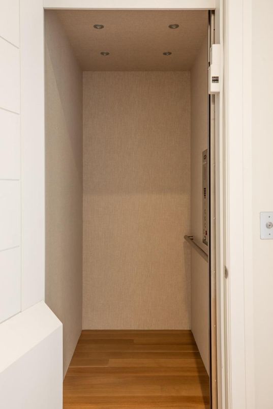 Elevator, Interior, Recessed Lighting, Wood Texture Flooring