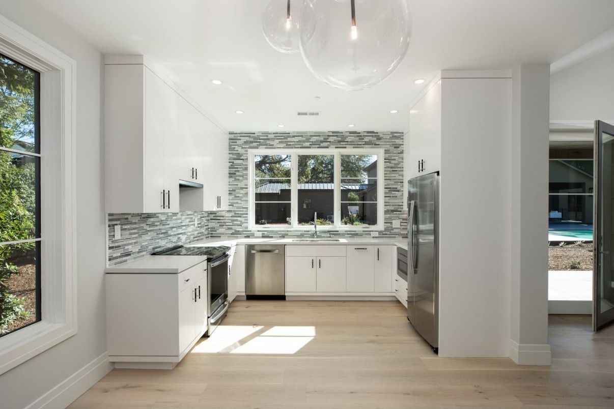 Interior, Kitchen, Pendant Lights, Recessed Lighting, Stainless Steel Appliances, Wood Texture Flooring